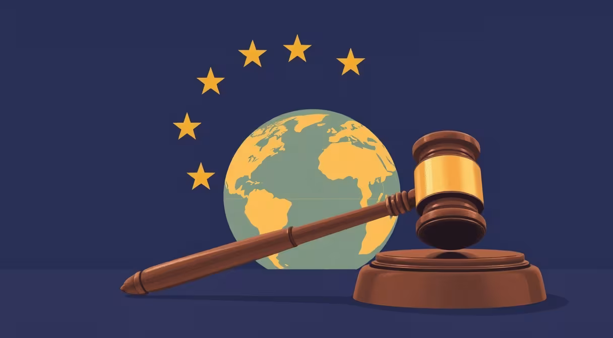 Gavel and globe representing international legal market with EU flag